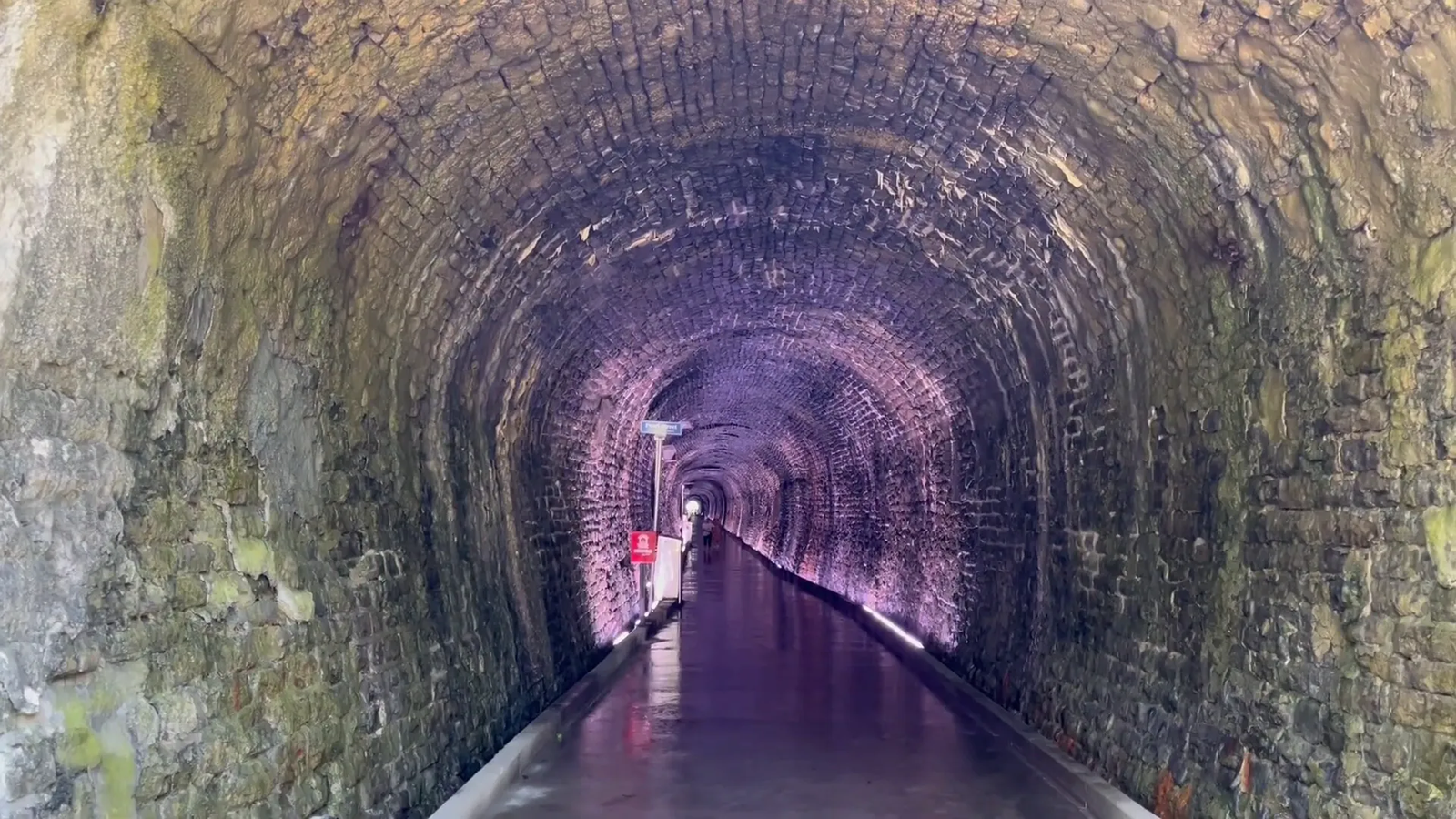 Donation box at Brockville Railway Tunnel for visitor contributions