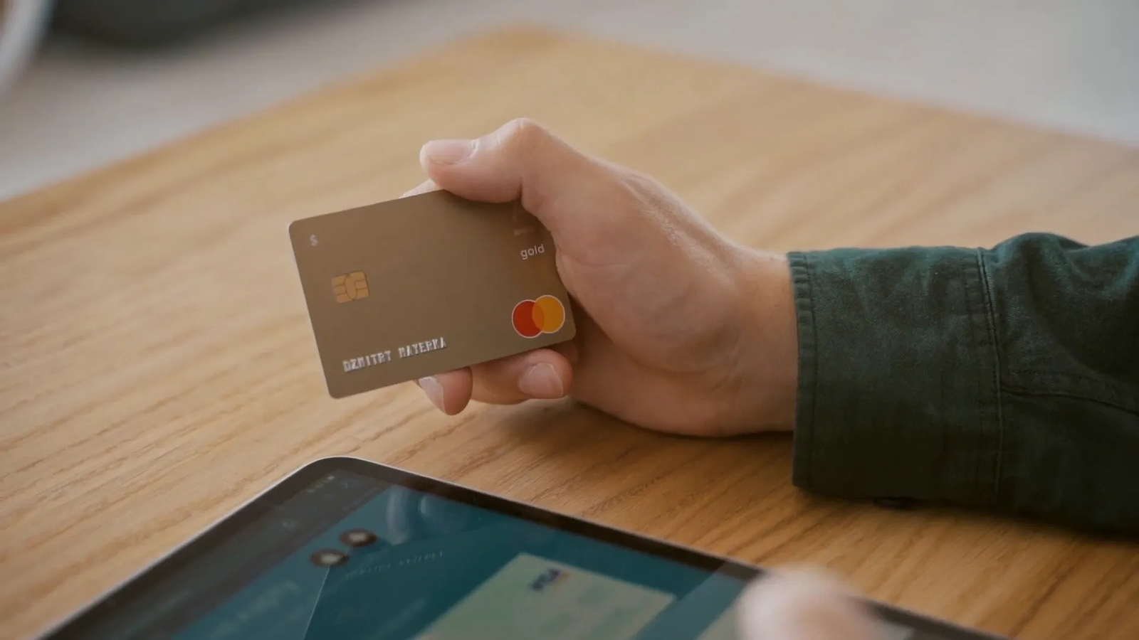 Bank teller assisting newcomer opening bank account